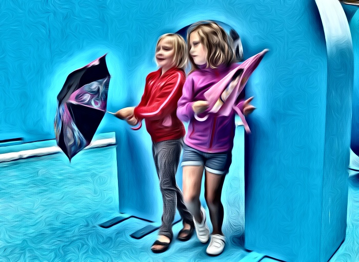 Två barn med paraply
